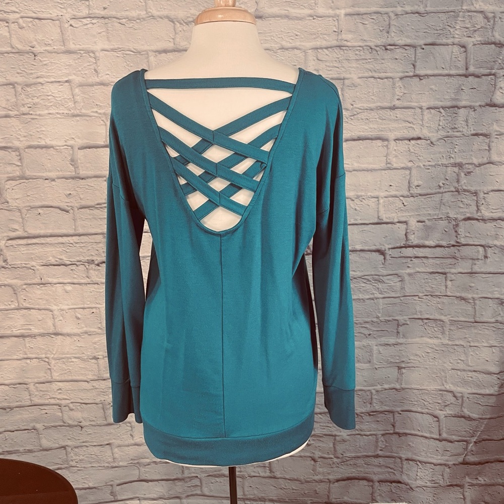 Teal blue sweatshirt with cross-cross back in size M, EUC